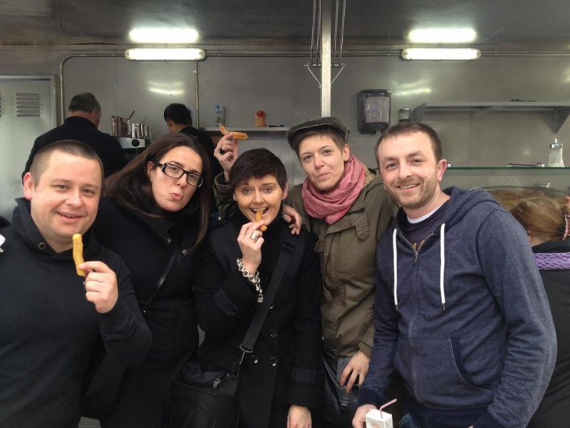 Our friends enjoying churros at the market
